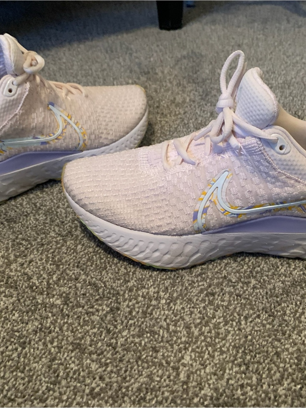 Nike women’s  Light Pink Knit Sneakers with Multicolor Swoosh